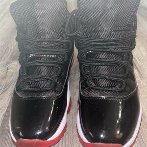Nike Black and Red Sneakers with Patent Leather and High-Top Design